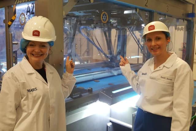 TOUR: Ms Brabin with plant manager Sarah Sordy at the Dentastix line.